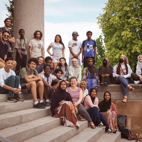 The 2021-22 cohort of Narratio Fellows and their mentors on the steps on Hendricks Chapel.