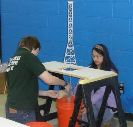 Students build a tower during the 2012 Mid-State Science Olympiad B Division tournament held at Syracuse University