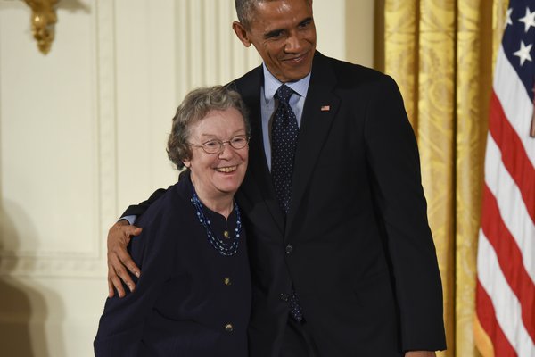 Edith Flanigen accepting an award from Barack Obama.