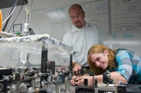 Timothy Korter, associate professor of chemistry, works with graduate student Ewelina Witko in the laboratory to create THz light