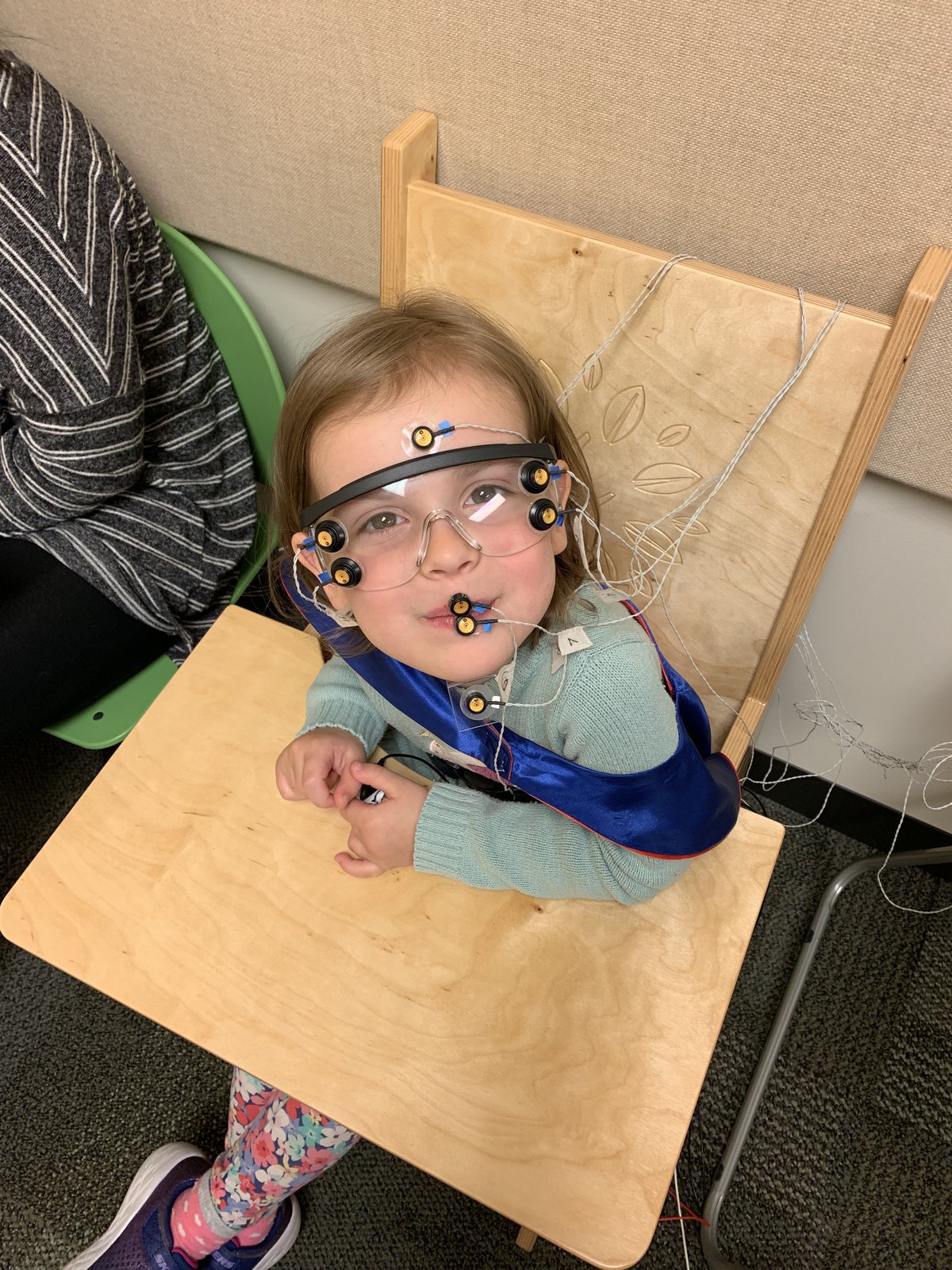 A child undergoing tests in the Syracuse University Stuttering Research Lab.