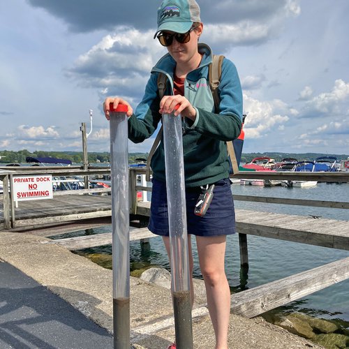 Earth and Environmental Sciences doctoral student Laura Streib with sampling cores.