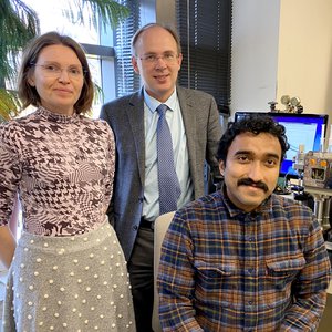 Syracuse University Professors Olga Makhlynets (left) and Ivan Korendovych (center), and graduate student Sagar Bhattacharya (right), in a research lab.