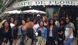 Paris Noir participants gather in front of Cafe de Flore