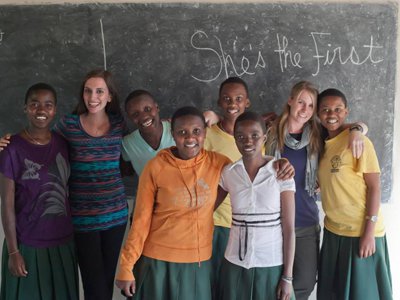 Christen Brandt, second from right, with She’s the First Scholars in Tanzania. The organization’s co-founder, Tammy Tibbetts, is second from left. 