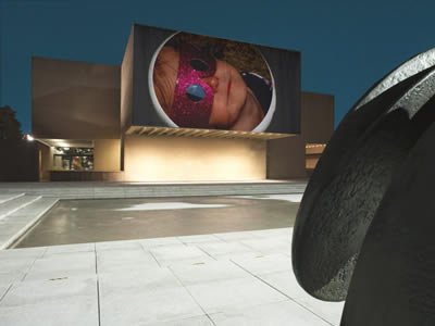 Eva Marie Rødbro's "Tropistic Creatures" (2018) on the Urban Video Project's architectural projection venue at the Everson Museum.