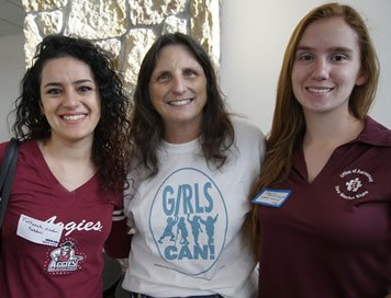 DeMar at GIRLS CAN! with Fattaneh Naderi-Behdani (far left), a Ph.D. candidate in chemical engineering at NMSU, and Greenamyer, a geography major.