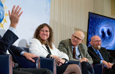 González beaming at the 2016 announcement of LIGO's detection of gravitational waves.  