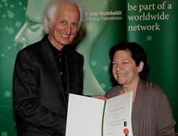 Helmut Schwarz, president of the Alexander von Humboldt Foundation, presents Jaklin Kornfilt with the Humboldt Research Award at a special ceremony in Bamberg, Germany.