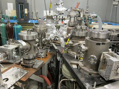 Vidali's team simulates interstellar conditions with a water-cooled, radio-frequency dissociation unit, shown here. The apparatus contains a mass spectrometer that produces charged particles for chemical analysis. 