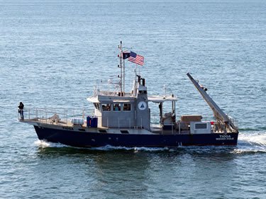 At Woods Hole, students often work aboard the R/V Tioga, shown here. (Photo by Ken Kostel, Woods Hole Oceanographic Institution)