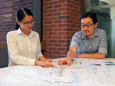 Wanyi Lu and her supervisor, Zunli Lu, in Syracuse's Heroy Geology Building.