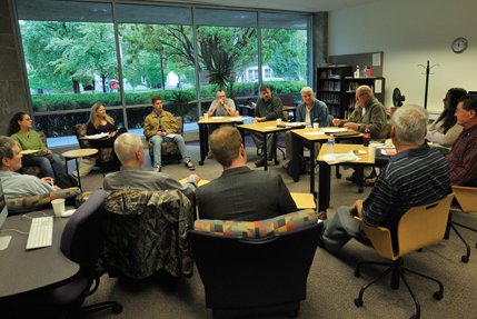 The Syracuse Veterans' Writing Group meets every month on campus. 